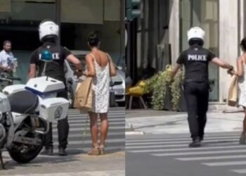 Αστυνομικός παίρνει από το χέρι τυφλή γυναίκα και την περνάει από τον δρόμο[video]