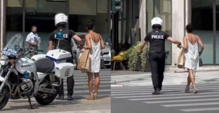 Αστυνομικός παίρνει από το χέρι τυφλή γυναίκα και την περνάει από τον δρόμο[video]