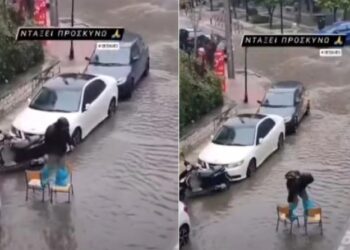 Viral και αποθεωτικά σχόλια: Κάθε μέσο για να διασχίσει τον πλημμυρισμένο δρόμο στο Μοσχάτο (video)