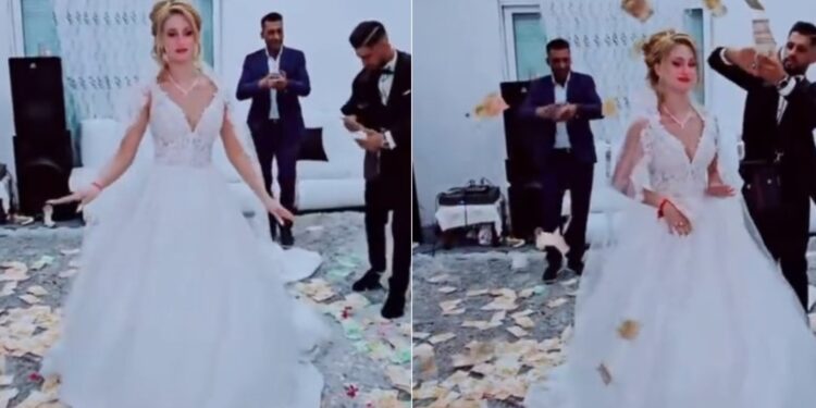 Alldaynews.gr Απίστευτο βίντεο από γάμο Ρομά στον Τύρναβο: Νύφη χορεύει πάνω σε… χιλιάδες ευρώ, ο γαμπρός την έραινε με… πενηντάρικα!