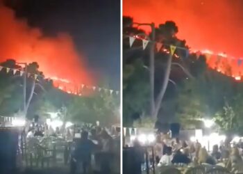 Απίστευτες εικόνες: Διασκέδαζαν στο πανηγύρι, ενώ η φωτιά έκαιγε ανεξέλεγκτα πίσω τους και ο ουρανός είχε γεμίσει καπνούς